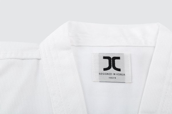 JCalicu Taekwondoanzug - Club - Weißer Kragen (JC-4002) JCalicu Taekwondoanzug - Club - Weißer Kragen (JC-4002)