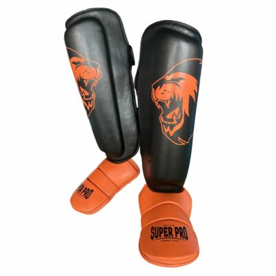 Super Pro Combat Gear Schienbein- und Spannschutz - Nations Holland - Schwarz / Orange Super Pro Combat Gear Schienbein- und Spannschutz - Nations Holland - Schwarz / Orange